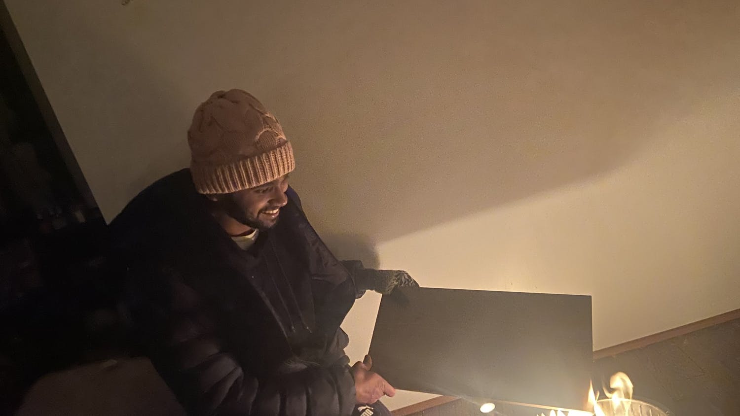 Karthik Ramkumar had to resort to burning a book to stay warm during Winter Storm Elliot.