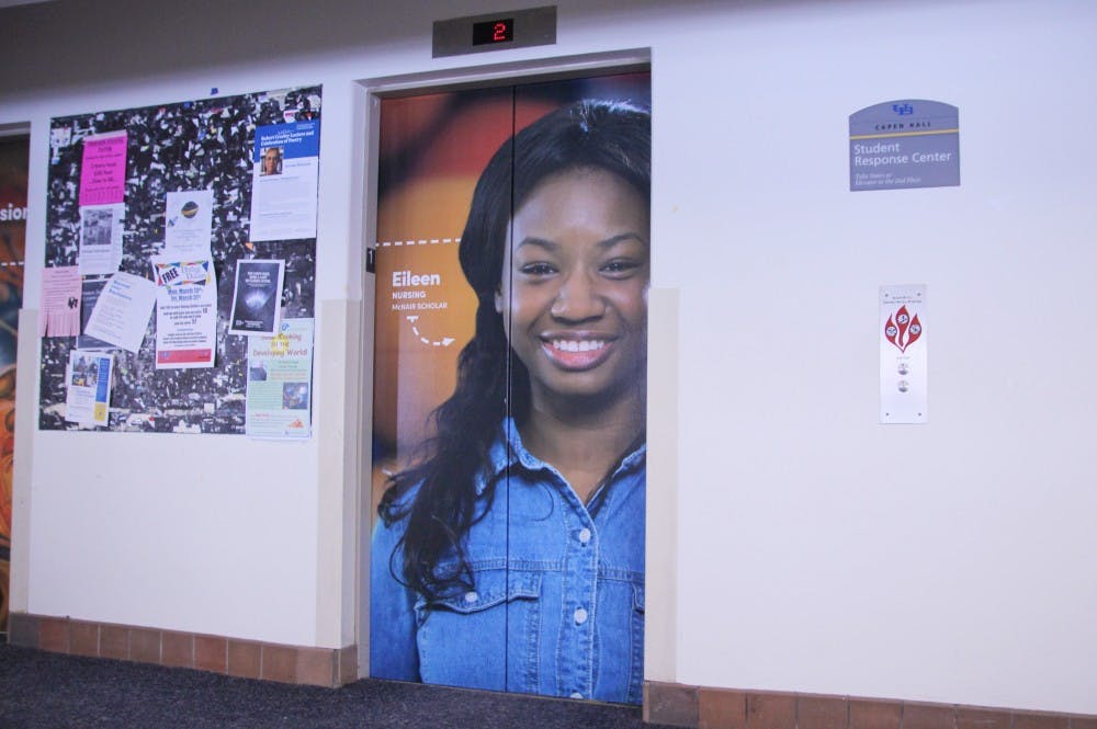 <p>Eileen Diih, a nursing major who graduated in May 2016 still has her picture featured on the Capen elevators despite her graduation last year. She was unaware her picture was going to be used.</p>