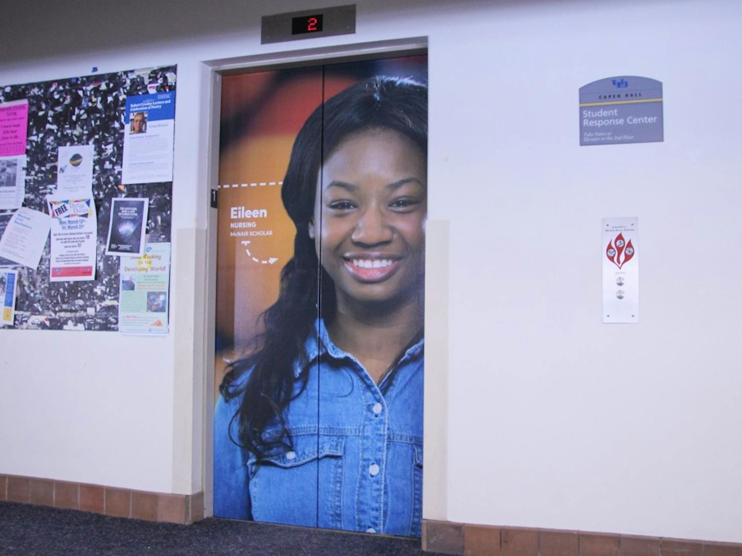 Eileen Diih, a nursing major who graduated in May 2016 still has her picture featured on the Capen elevators despite her graduation last year. She was unaware her picture was going to be used.