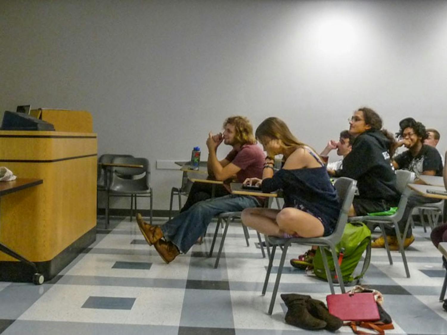 Students gather in Norton 214 for a meeting of UB Pagan Student Association. The group is a temporary SA club founded this year to help bring awareness to all of Paganism’s misconceptions in society. It meets every Thursday.
