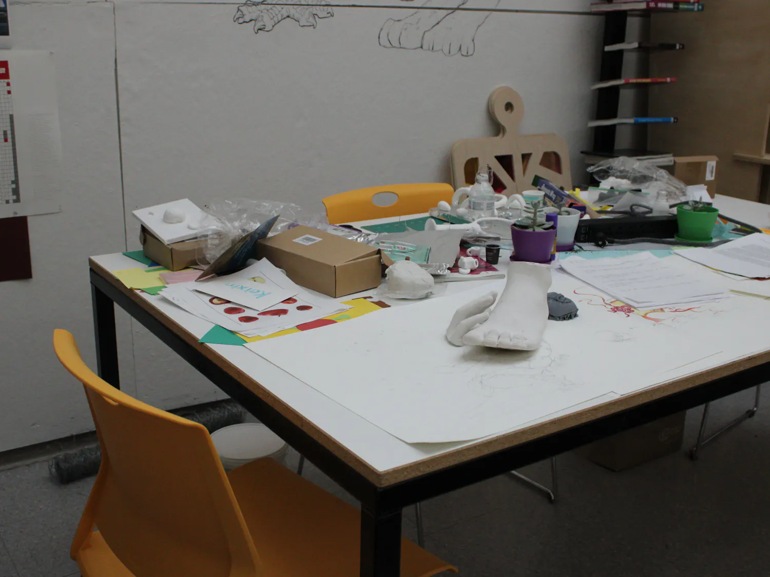 A work station holds Jiaye You's unfinished artwork for MEMORIA, this year's senior thesis exhibition. 