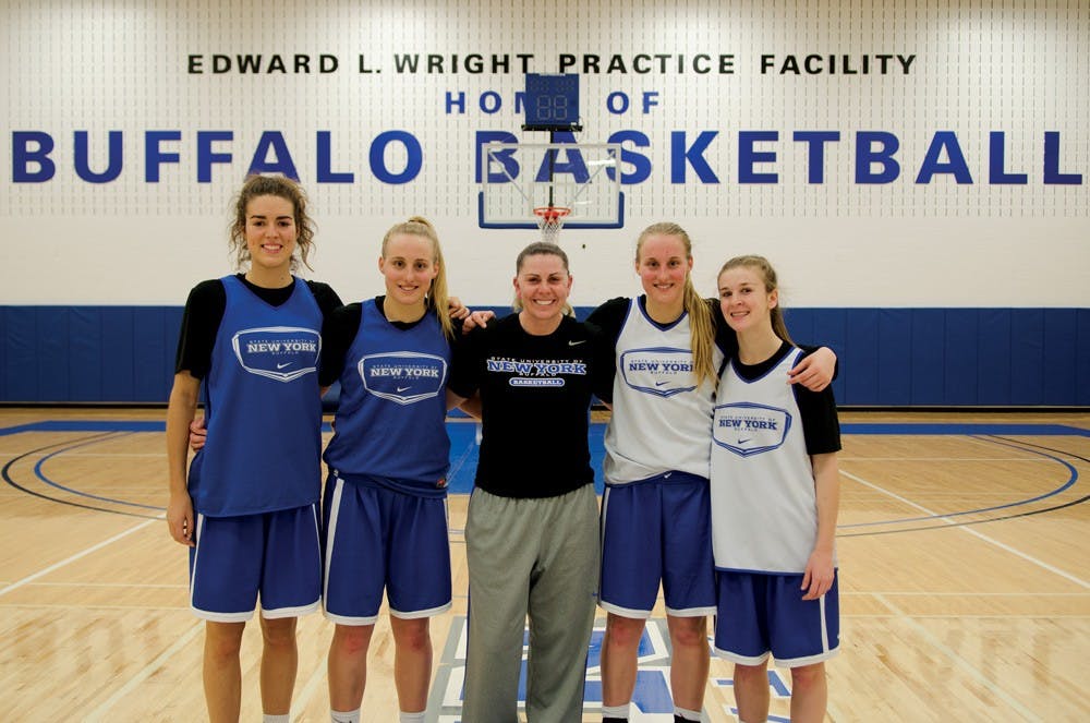 <p>From left to right, Courtney Wilkins, Katherine Ups, assistant coach Cherie Cordoba, Lisa Ups and Stephanie Reid. The women's basketball team features four Australian freshman this season. </p>
