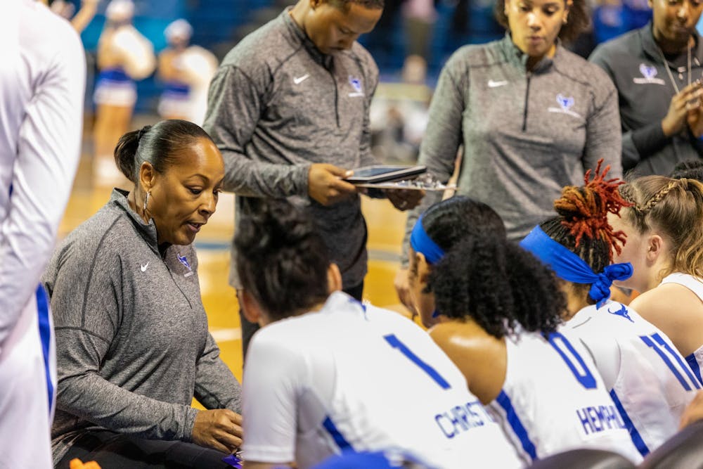 Women's basketball head coach Felisha Legette-Jack draws up a play during a November game against Daemen.