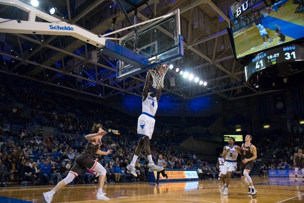 <p>David Kadiri goes up for a dunk.&nbsp;Several UB teams are seeing their seasons come to an end.</p>