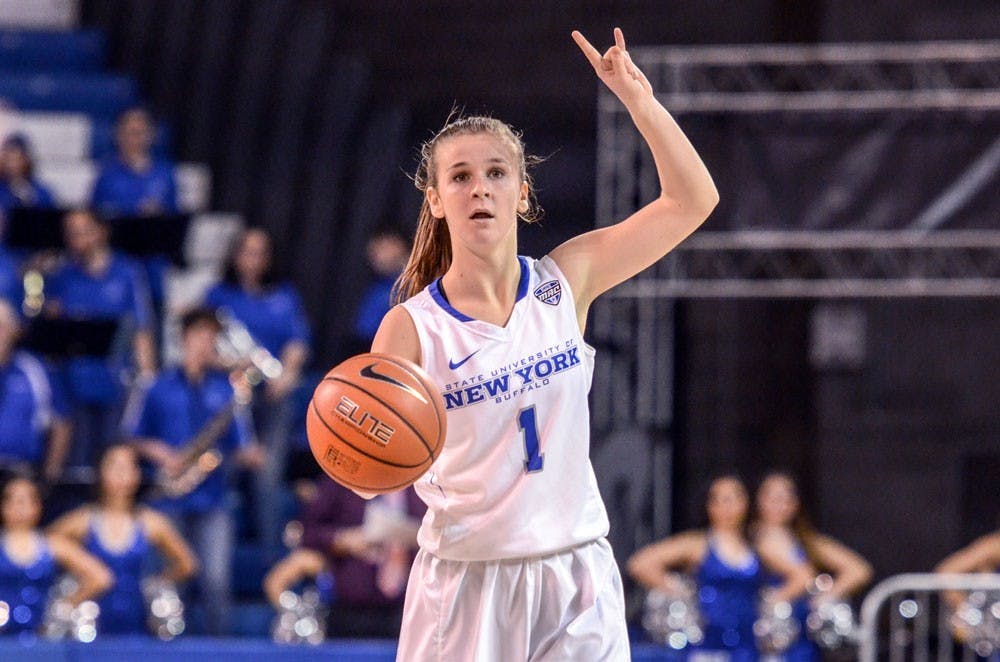 <p>Sophomore guard Stephanie Reid plays as a signal caller on Tuesday night in Alumni Arena. Reid scored a team-high 12 points with six assists, seven rebounds and three steals.&nbsp;</p>