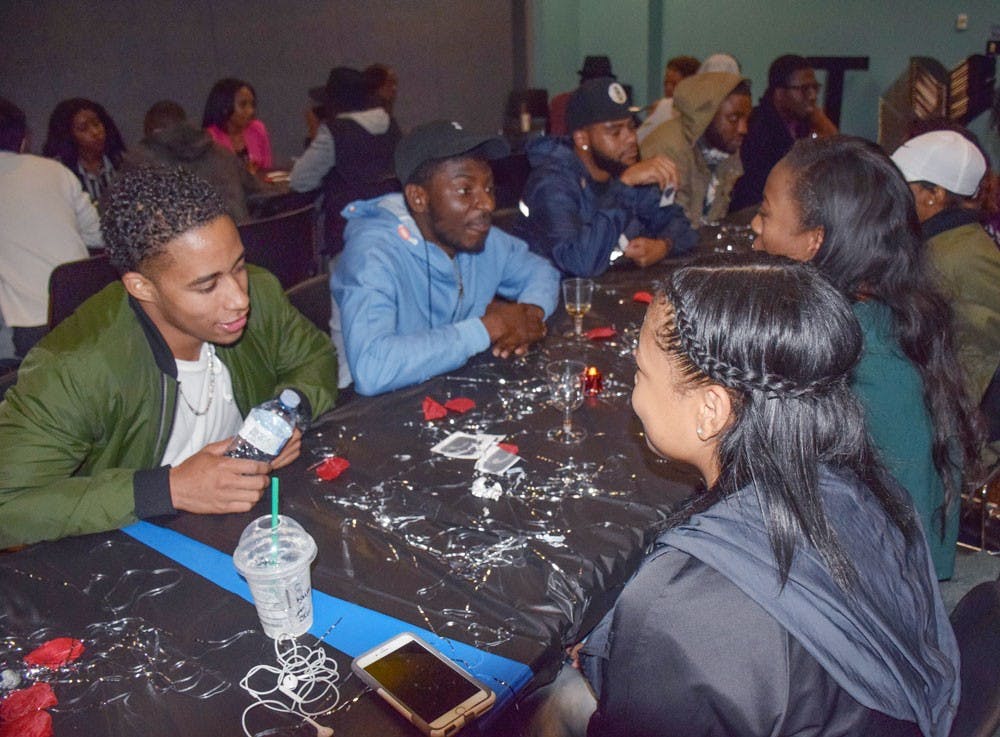 <p>Students participate in speed dating in the Student Union Thursday night. </p>