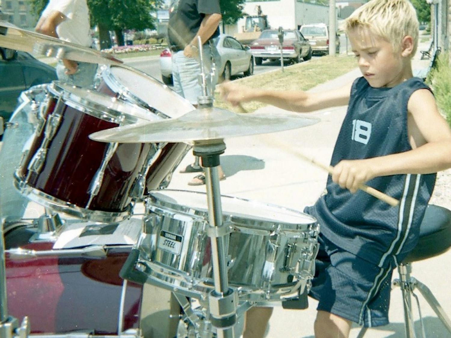 Justin Bieber’s hometown is honoring him at the Stratford Perth Museum in Steps to Stardom, an exhibit which highlights Bieber’s journey to fame. Bieber was a regular street performer in Stratford, Ontario, as shown above playing drums in 2002.
