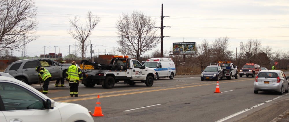 <p>The two vehicles in an accident near University Place on Sweethome Road. were both towed away. The accident resulted in minor injuries after the grey SUV rear-ended the blue sedan and rolled on its side. </p>