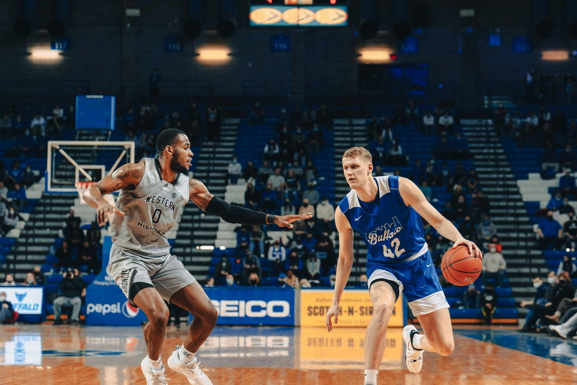 Redshirt sophomore center David Skogman dribbles the ball during a recent game against Western Michigan.