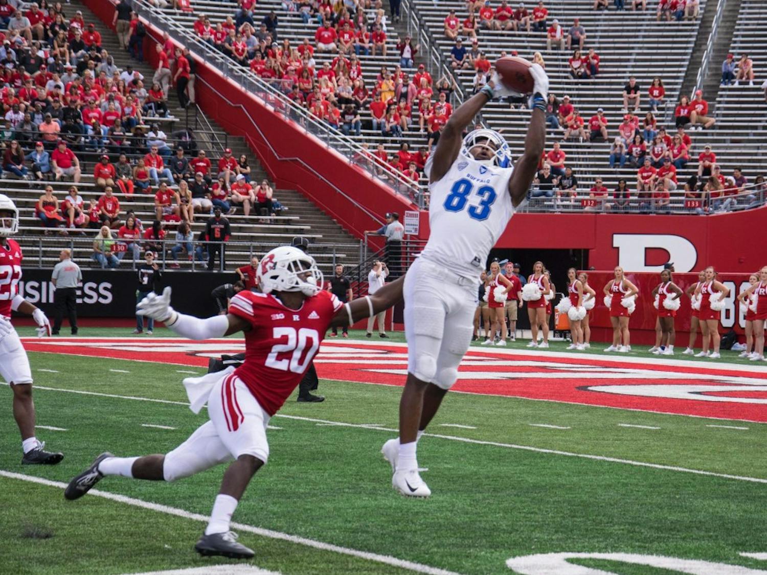 Senior star wide receiver Anthony Johnson leaps to haul in a 59 yard pass. Johnson led the team in receiving with two receptions for 101 yards and a touchdown. 