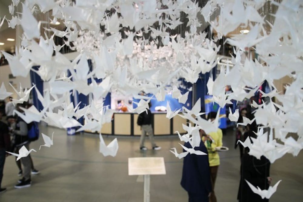 The Organization of Arab Students (OAS) hung up 2,000 paper white cranes in the Student Union on Monday as a part of their Syrian Awareness Week. Each crane symbolized 100 deaths in the Syrian War. The club wants to educate the UB community on the tragedies of the war.&nbsp;Yusong Shi, The Spectrum