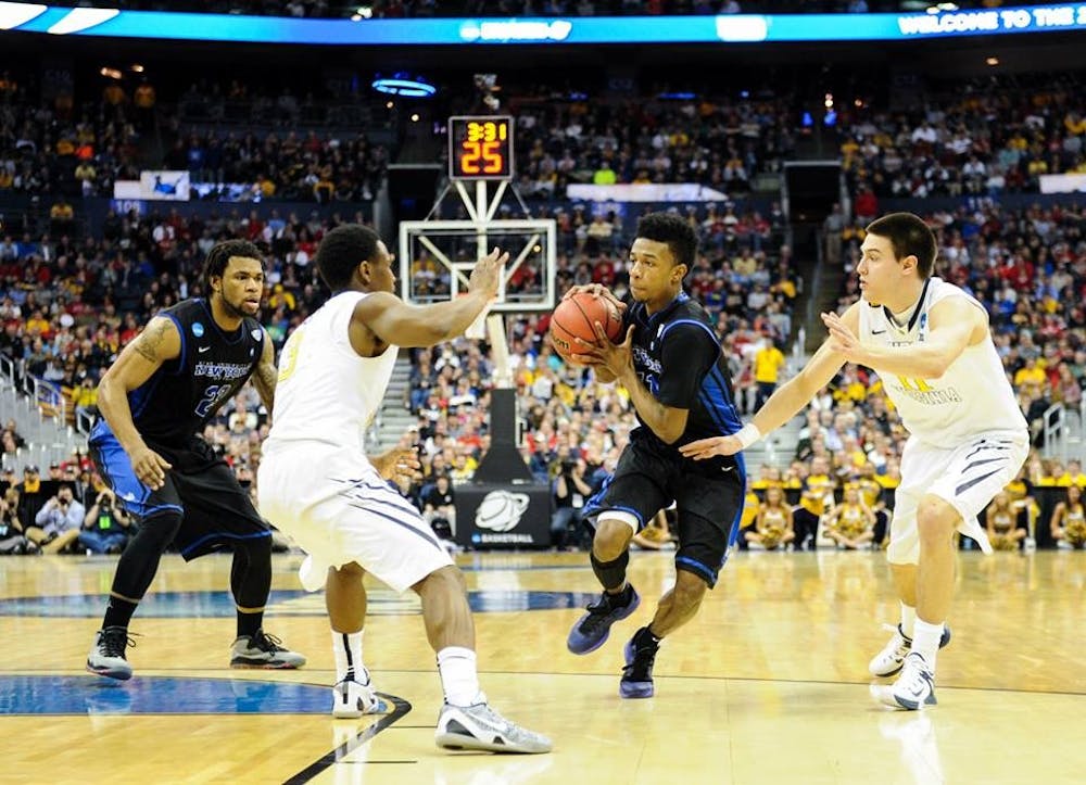 <p>Shannon Evans drives to the basket in Buffalo's first-ever NCAA Tournament appearance on March 20 against West Virginia in Columbus, Ohio. The Bulls gained national exposure this season behind its first NCAA tournament bid and MAC championship. </p>