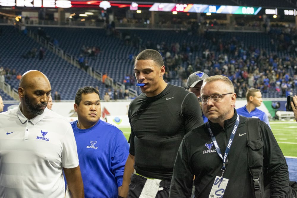 <p>Junior quarterback Tyree Jackson walks off the field at the Mid-American Conference title game. Jackson had 274 yards passing, one touchdown, an interception and a fumble in what could be his final game as a Bull in the Dollar General Bowl Saturday night.</p>