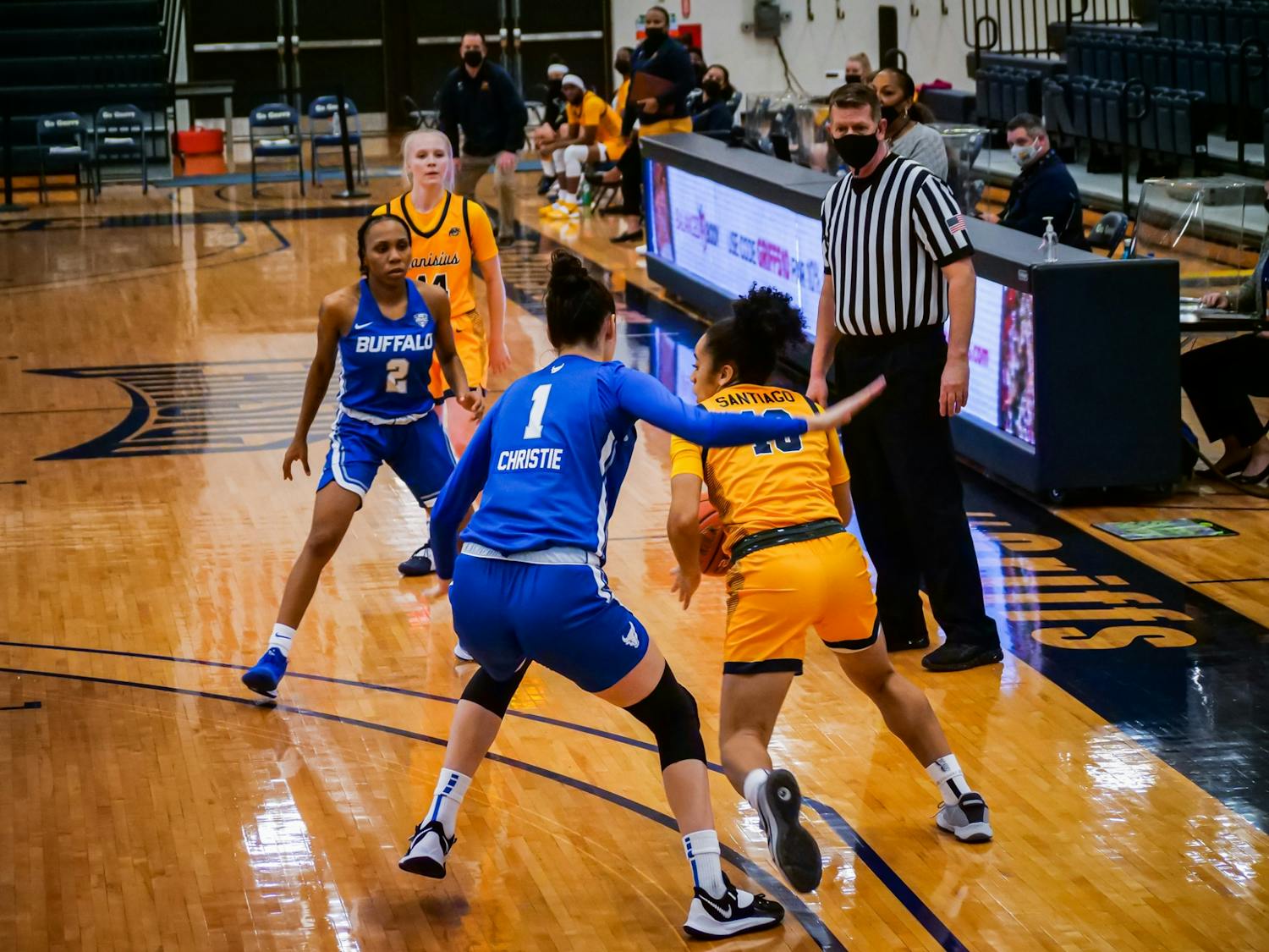 Loren Christie (1) and Dyaisha Fair (2) play defense during a recent women's basketball game.