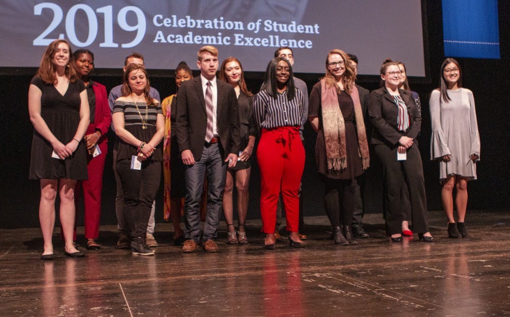 &nbsp;Students pose for a photo after being recognized for awards. UB recognized over 90 students at its 15th annual Celebration of Student Academic Excellence on Thursday.&nbsp;