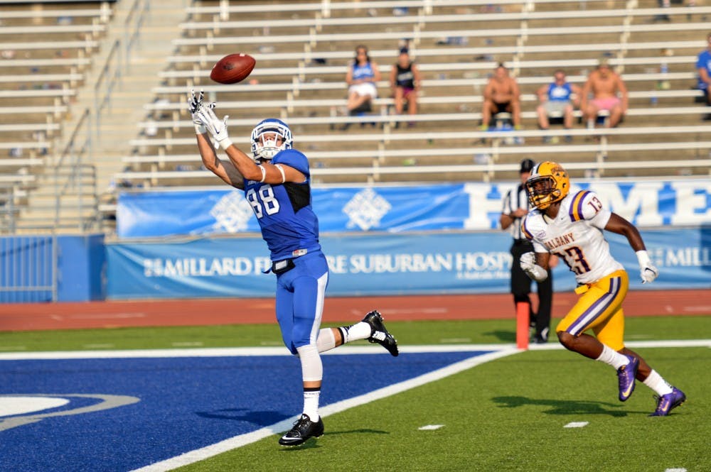 <p>Sophomore wide receiver Jacob Martinez catches a touchdown pass in last season’s opener against  Albany. Now a junior, Martinez is expected to be one of the key receivers in Buffalo’s offensive attack this season.</p>