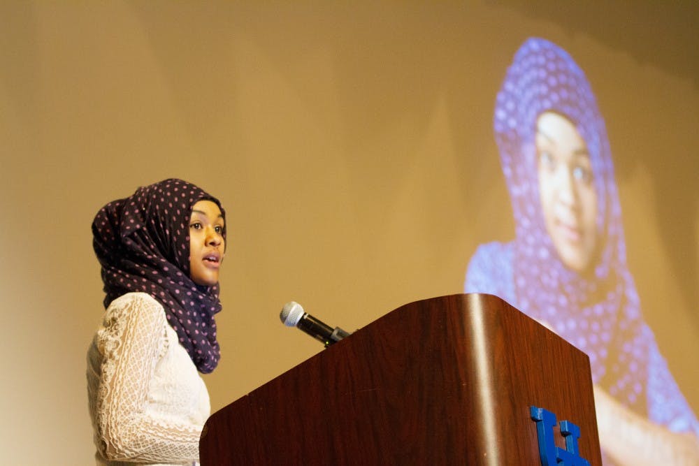 <p>Juweria Dahir, a graduate sociology student, spoke at the Dear World Symposium this Tuesday. She had the words “ISIS hijacked Islam” written on her arms to symbolize the growing islamophobia in America.</p>