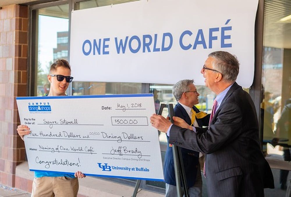 Announcement of the newly named 'One World Cafe', the world market eatery to come on North Campus.  Photographer: Douglas Levere