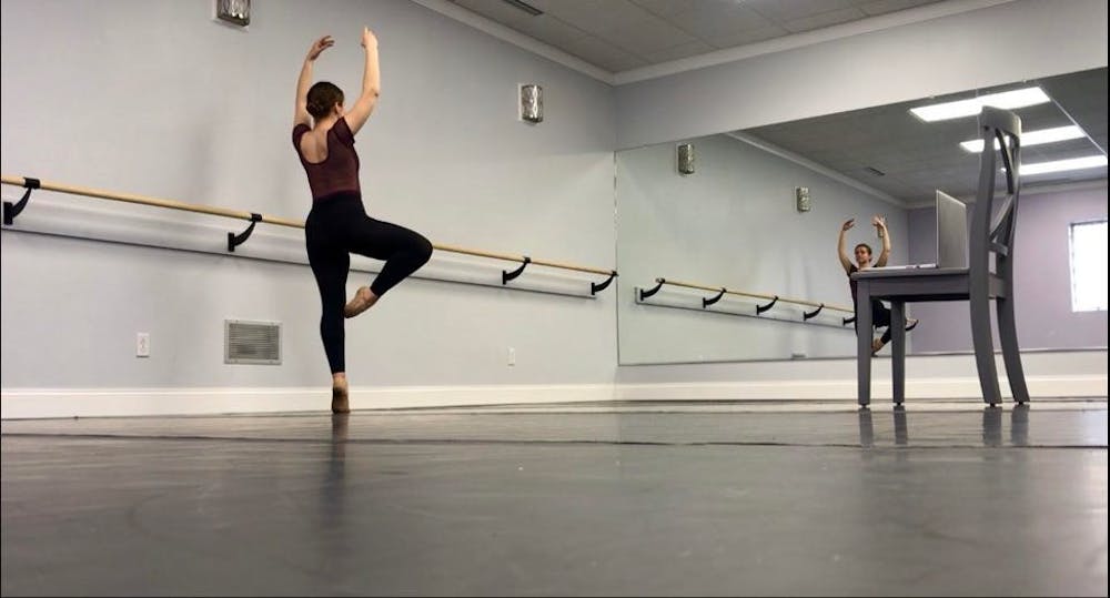 <p>Sophomore dance major Kelsey Wegman practices her craft alone in her own studio.</p>