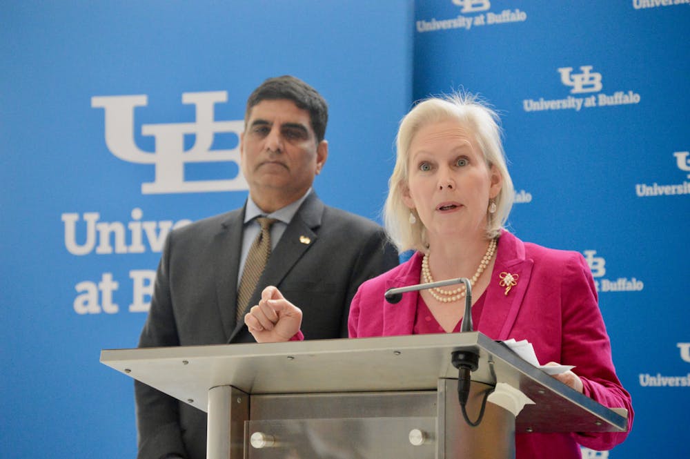 Sen. Kirsten Gillibrand speaks against the Trump administration's cuts to research funding on Friday, Feb. 14, 2025, while UB Vice President for Research and Economic Development Venu Govindaraju looks on.