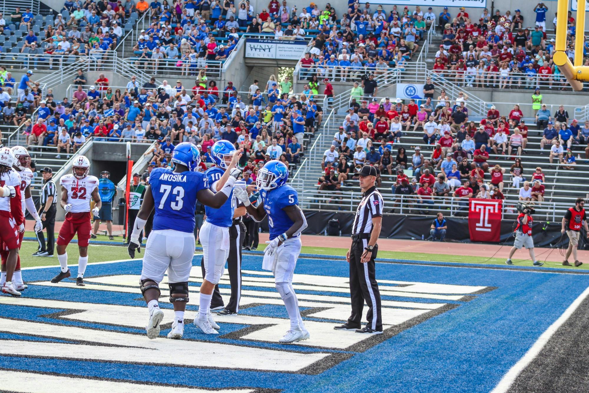 Students can expect to stand shoulder-to-shoulder with their peers at football games in the fall.