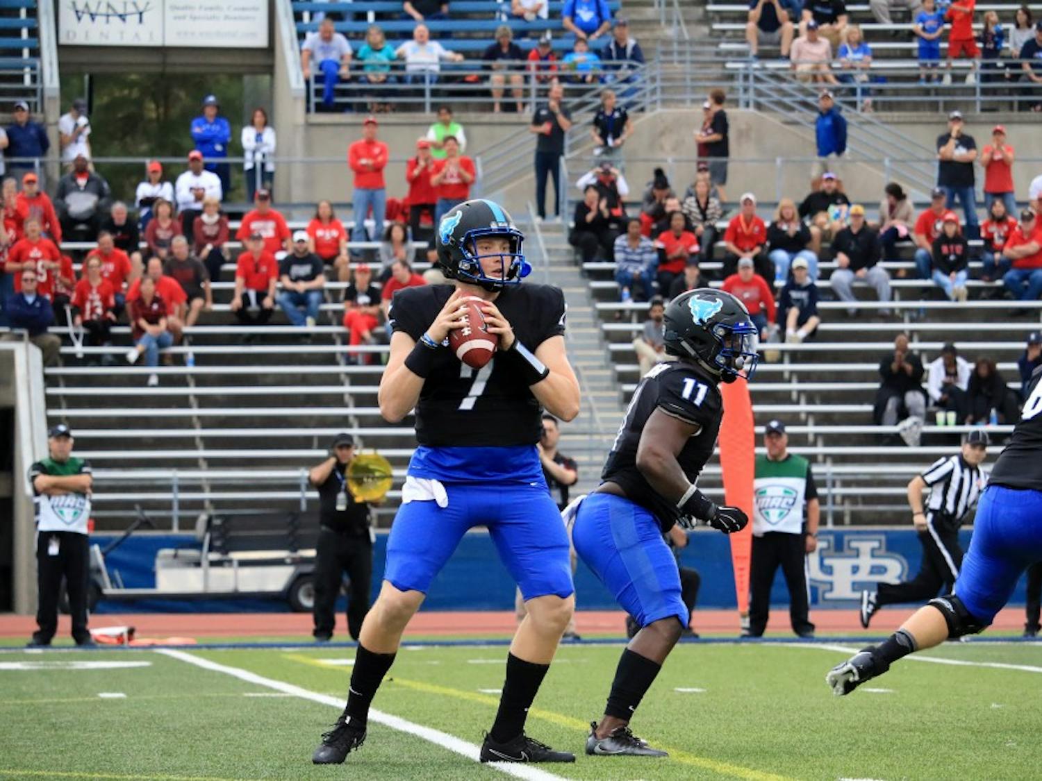 Freshman quarterback Kyle Vantrese drops back for a pass. Vantrese has appeared in a game and a half for the Bulls, but will now take on a reverse role. 