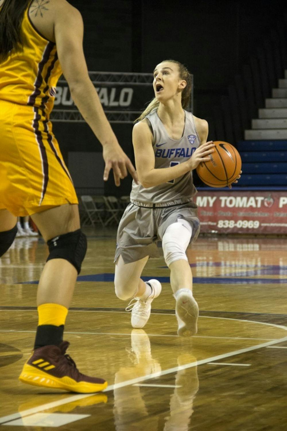 <p>Stephanie Reid picks up her dribble. Reid has played for two professional teams since leaving UB, both in her native country of Australia.</p>