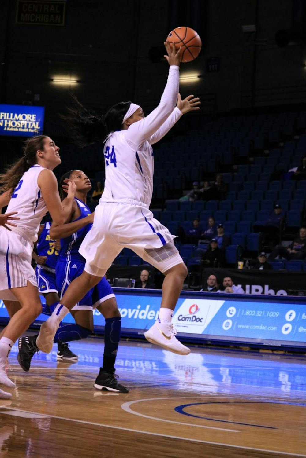 <p>Senior guard Cierra Dillard goes for the layup while pressed in the paint. Dillard was the lead scorer for the Bulls last season and hopes to improve.</p>