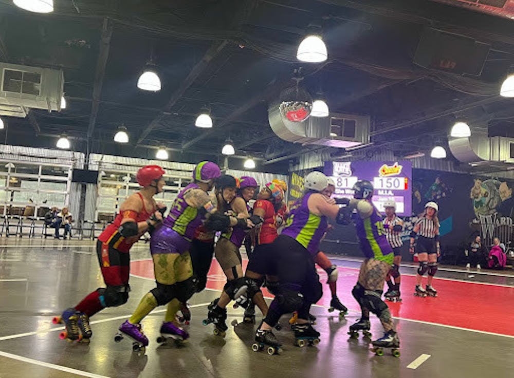 <p>the Alley Kats and the Saucies Roller Derby teams</p>