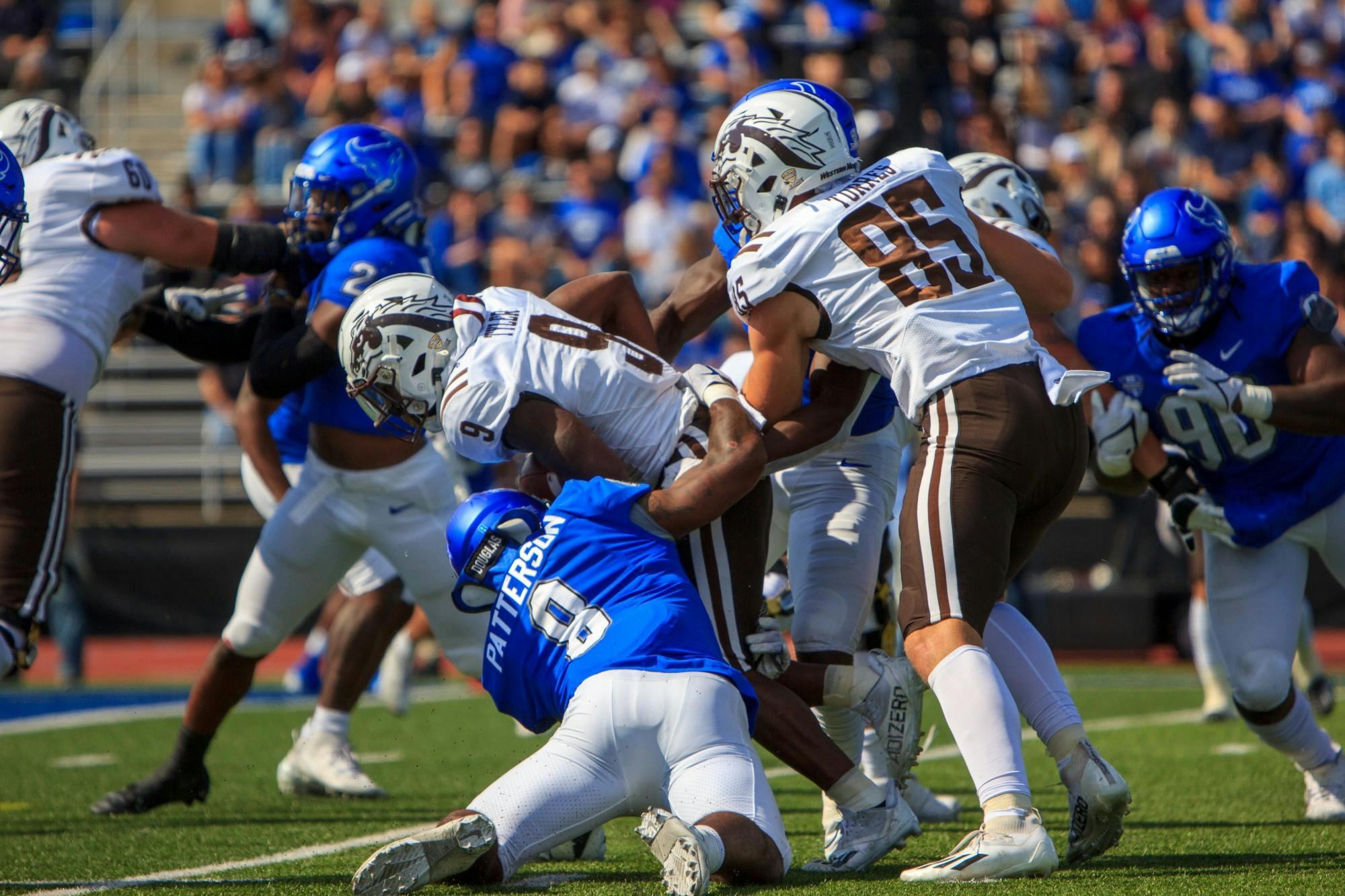 Senior linebacker James Patterson (8) makes a tackle during a 24-14 loss to Western Michigan Saturday.
