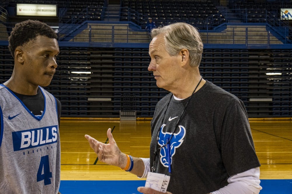 Coach Whitesell takes aside Davonta Jordan for advice and encouragement after practice.