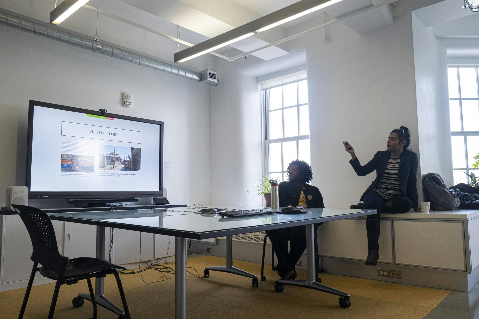 Kafuli Agbemenu (left) and Shaanta Murshid (right) present two different yet connected perspectives on women's health during a Global Health Equity Brown Bag Seminar.