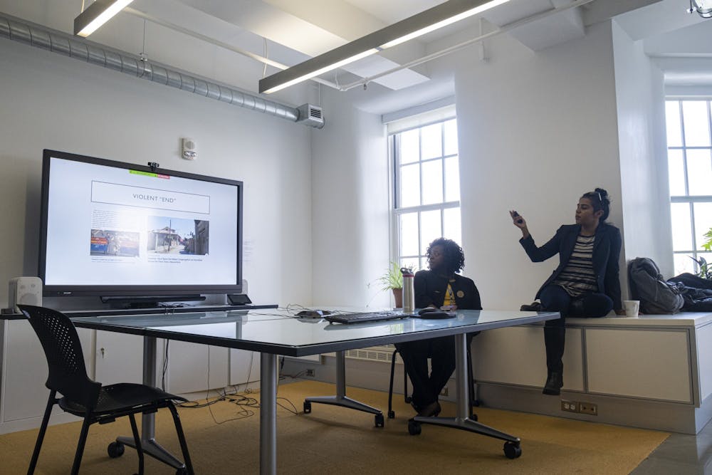 <p>Kafuli Agbemenu (left) and Shaanta Murshid (right) present two different yet connected perspectives on women's health during a Global Health Equity Brown Bag Seminar.</p>
