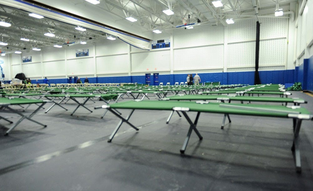 <p>Residents of Red Jacket were evacuated after a broken sprinkler line caused a power outage in the complex. Temporary shelter and cots were provided to displaced students.</p>