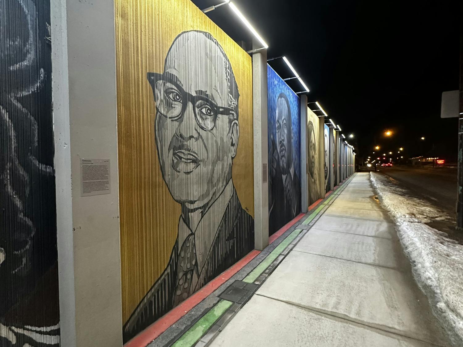 The “Freedom Wall” art gallery is a Public Art Initiative, in partnership with the Michigan Street African American Heritage Corridor and local stakeholders, conceived this mural to honor the nation’s historic and ongoing fight for political and social equality, highlighting the pivotal and enduring contributions of local leaders to this cause.