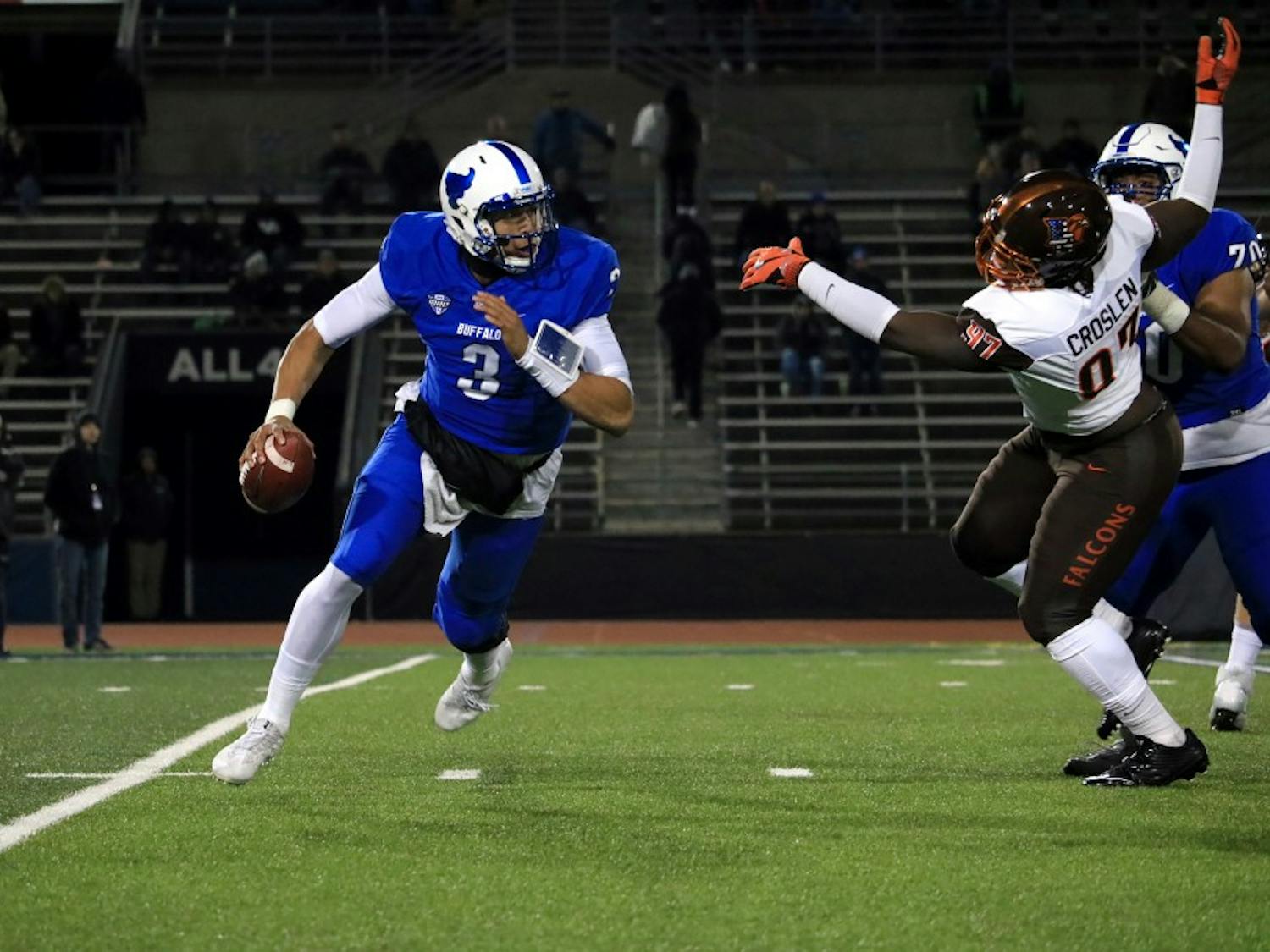 Sophomore quarterback Tyree Jackson running out of the pocket. Jackson lead the Bulls to a 38-28 win over the Bowling Green Falcons Tuesday night.