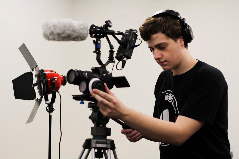 <p>Salvatore Natale uses equipment to work on a project. Natale&nbsp;will be graduating in the spring and feels the Media Study department has not prepared him for the real world.&nbsp;</p>