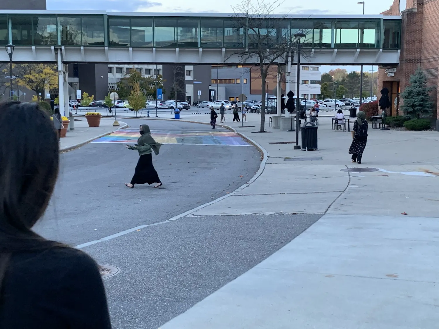 Students walking outside the Student Union and The Commons
