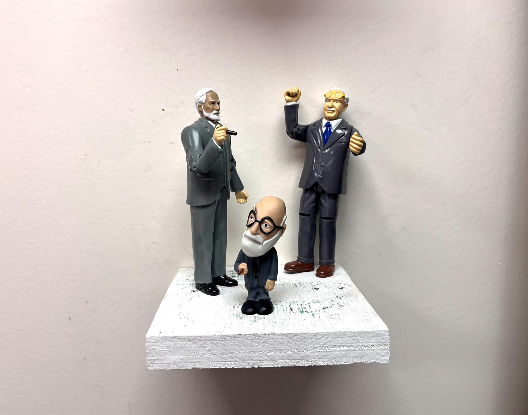 Figurines of psychoanalysts inside of The Center for the Study of Psychoanalysis and Culture.