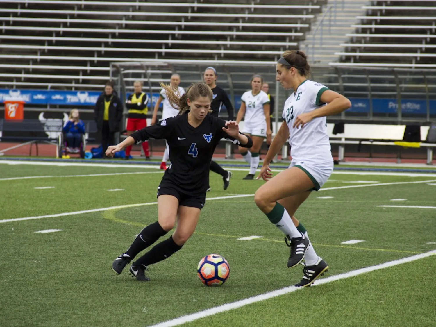 Sophomore midfielder Kaitlyn Walsh dribbles past a defender. Soccer split the weekend 1-1 on the road in conference play.