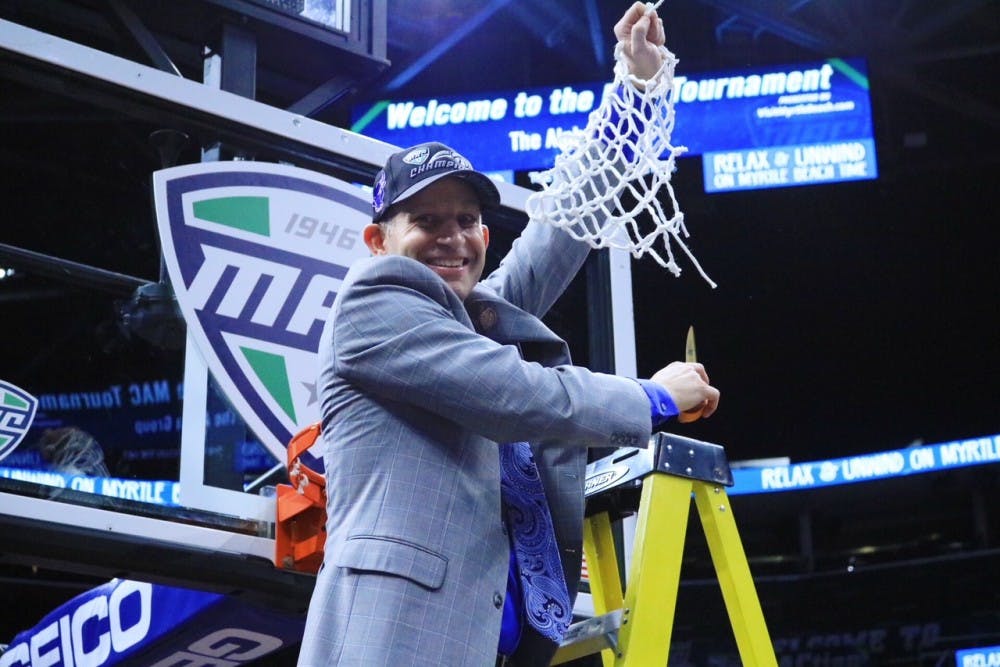 <p>Nate Oats cuts down the net after winning the Mid-American Conference Championship. Oats is confident the Bulls can beat any team they play this year.</p>