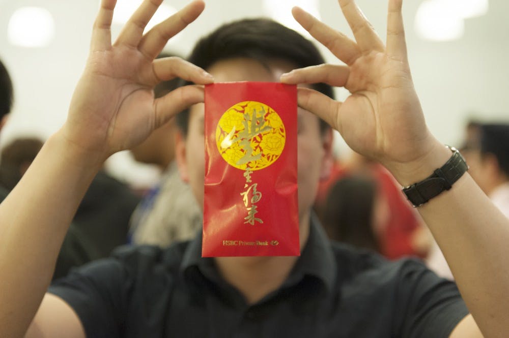 <p>Students were able to celebrate the Chinese New Year on Tuesday with traditions including the sharing of envelopes and traditional holiday food.</p>