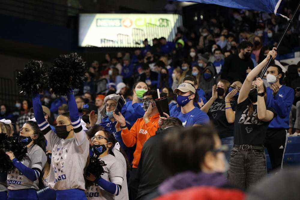 Members of the True Blue cheering section make noise during a near-sellout game against Toledo in February.