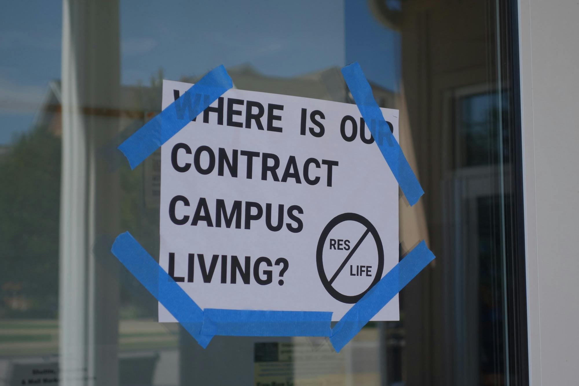Signs like this one have gone up across campus in the days after enFOCUS' letter was published.&nbsp;