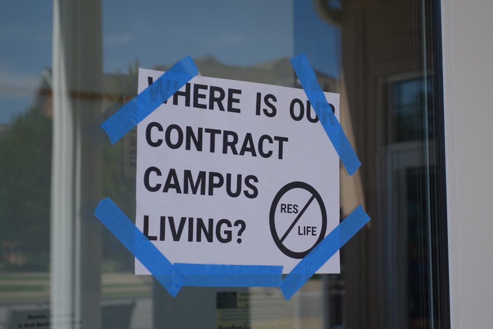 <p>Signs like this one have gone up across campus in the days after enFOCUS' letter was published.&nbsp;</p>