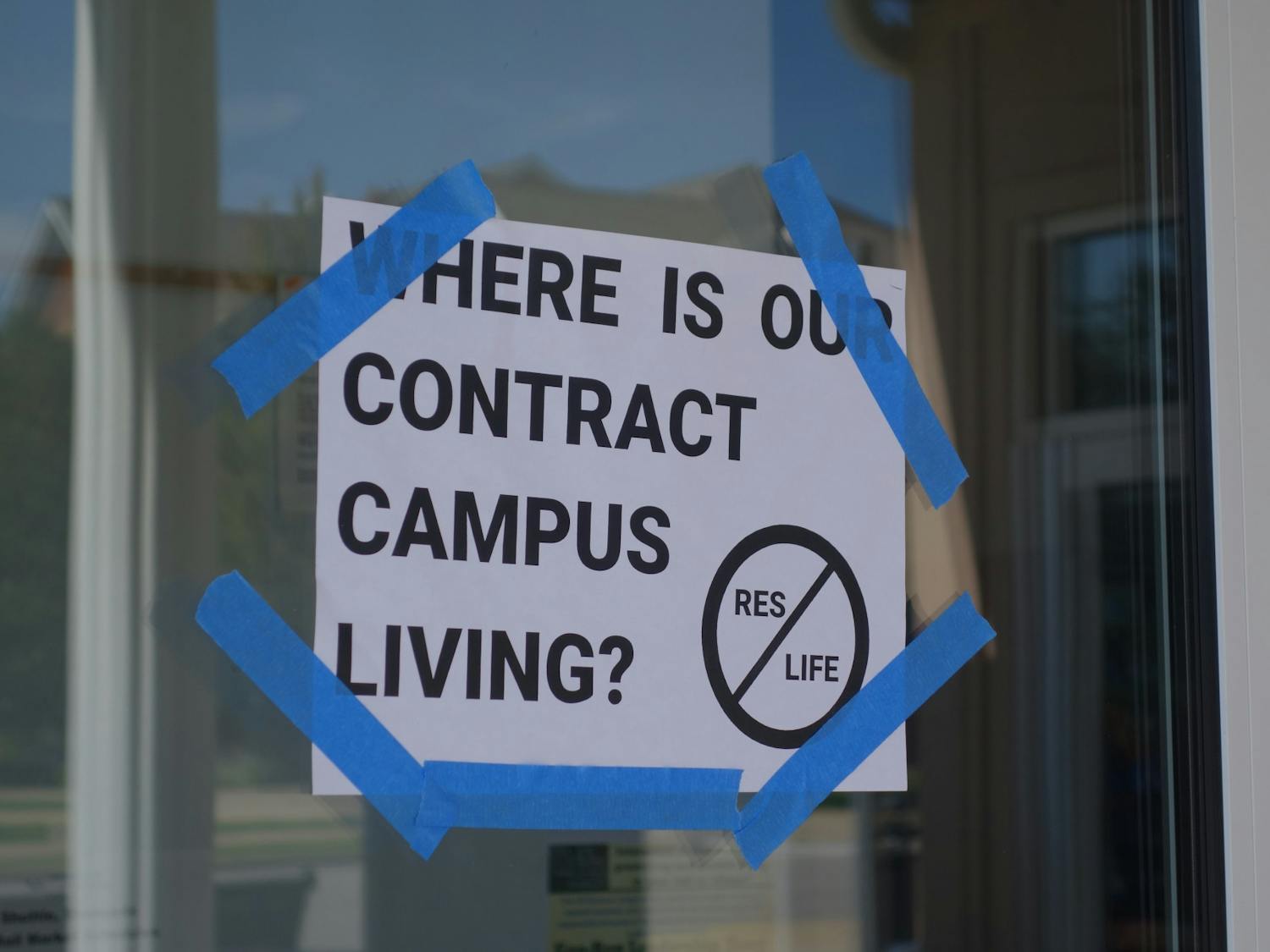 Signs like this one have gone up across campus in the days after enFOCUS' letter was published.&nbsp;