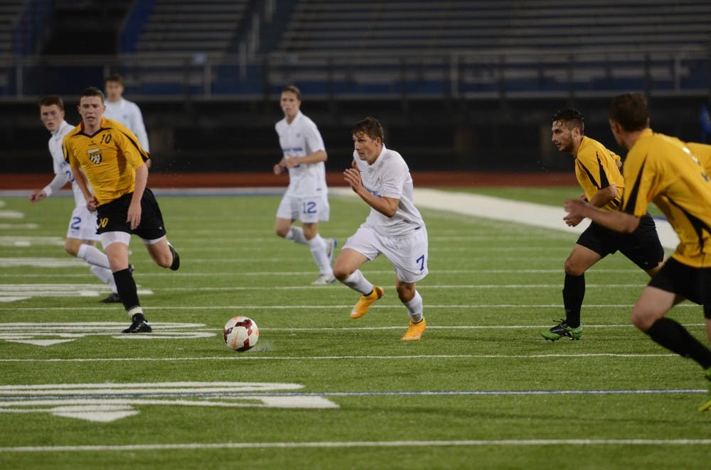 <p>Senior forward Russell Cicerone dribbles the ball. UB will face off against Bowling Green in the first round of the MAC Tournament.</p>