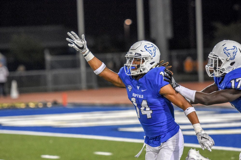 <p>Sophomore Brandon Williams celebrates a tackle. Bulls lost senior day game to Miami Ohio.</p>