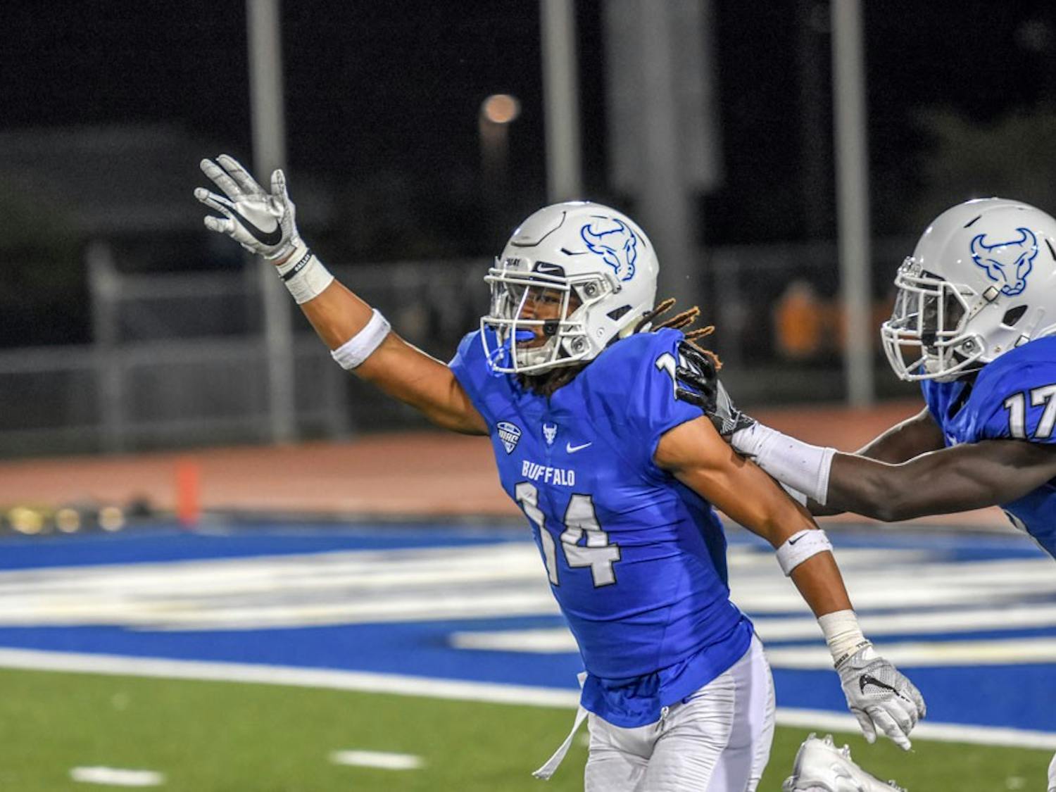 Sophomore Brandon Williams celebrates a tackle. Bulls lost senior day game to Miami Ohio.
