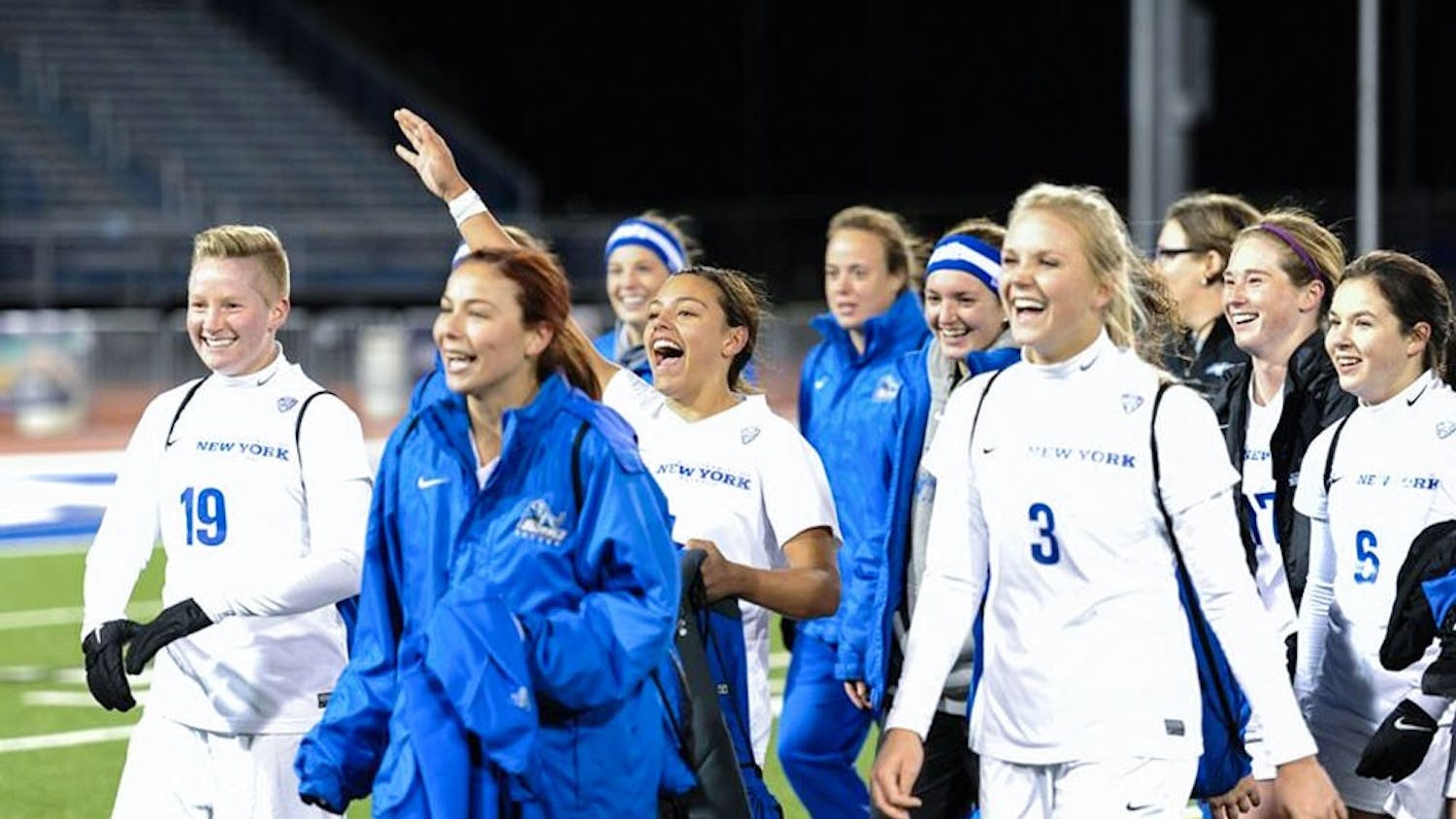 Members of the 2015-16 UB women's soccer team celebrate after a matchup in the MAC Tournament. Kay players will not return next year, but a solid spring season leaves Shawn Burke relaxed about replacing them.&nbsp;